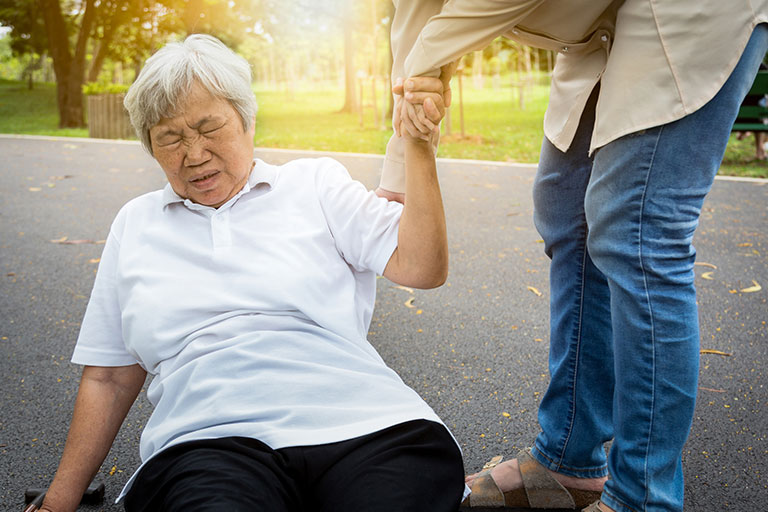 Balance Problems Image - Elderly woman on the floor getting up.